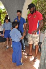 Chris Gayle and Siddharth Mallya spend time with NGO kids in Worli, Mumbai on 26th April 2013 (37).JPG